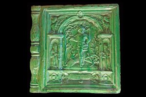 Fragment einer über Eck geführten Blattkachel der Monatsserie nach Amman: November, in Rahmen Typ 3, grün glasiert, nach 1603, Obernzell, Keramikmuseum